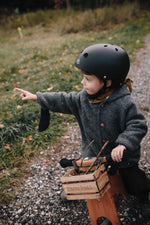 Load image into Gallery viewer, Kinderfeets Toddler Bike Safety Helmet in Matte Black. Adjustable Fit Dial System and padded chin strap provide additional comfort while an ABS outer shell and EPS liner ensure child safety.
