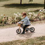 Load image into Gallery viewer, Kinderfeets Tiny Tot Plus tricycle balance bike wooden training bike running bike no pedals toddler children kids birch wood slate blue kids safety bike helmet black white sage rose pink